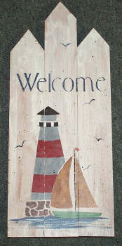 Nautical fence with lighthouse plaque