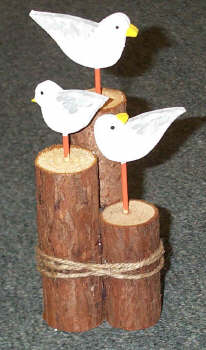 Seagulls on wood poles